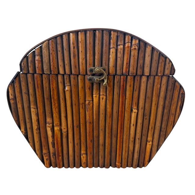 Split reed bamboo box. Brass closure and brass rings on each side.