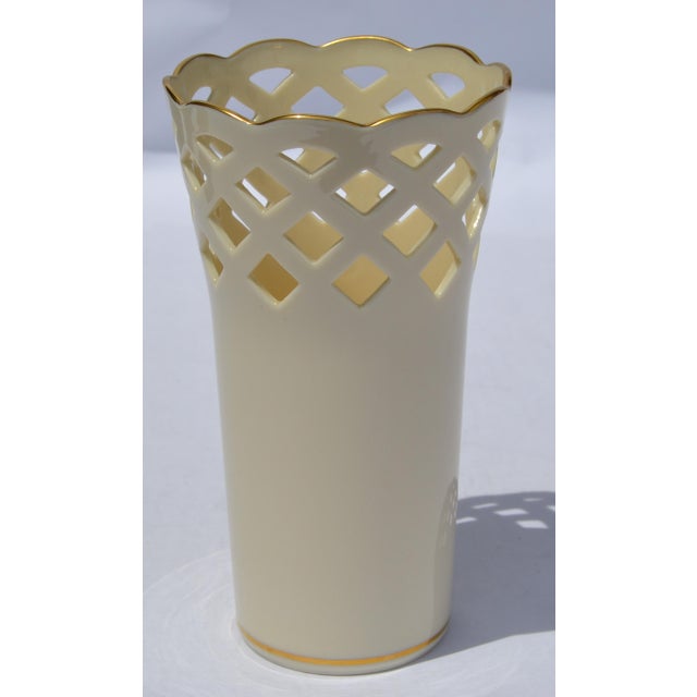 The Vintage Lenox 6.5-inch Wicker Vase with 24K gold trim is a handcrafted fine ceramic, bone china vase featuring an...