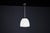 This elegant pendant lamp, designed in the 1950s in czech republic, is a striking example of bauhaus influence on mid-...