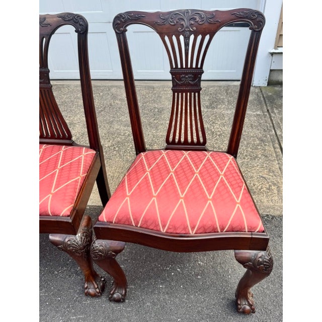 Beautiful vintage set of 4 quality mahogany English Chippendale style chairs with cabriole legs ending in ball and claw...