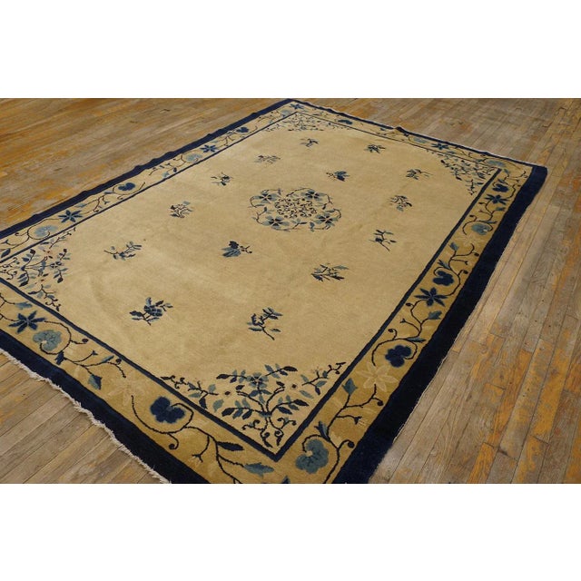 Antique Chinese - Peking rug, measures 6' 0'' x 8' 10''. Chinese - Peking The commercial Peking carpet is a later 19th...