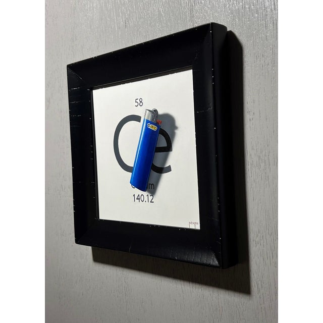Contemporary Cerium by Patrick Nevins | Oil on Board Blue lighter on a white background with text. For Sale - Image 3 of 3