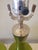 Green glass table lamp, clear Lucite base, clear cord, takes 3 way bulb. Works perfectly.