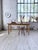 Vintage 1960s farmhouse table made entirely of solid elm. We love the wood grain and its luminous golden hue. The thick...