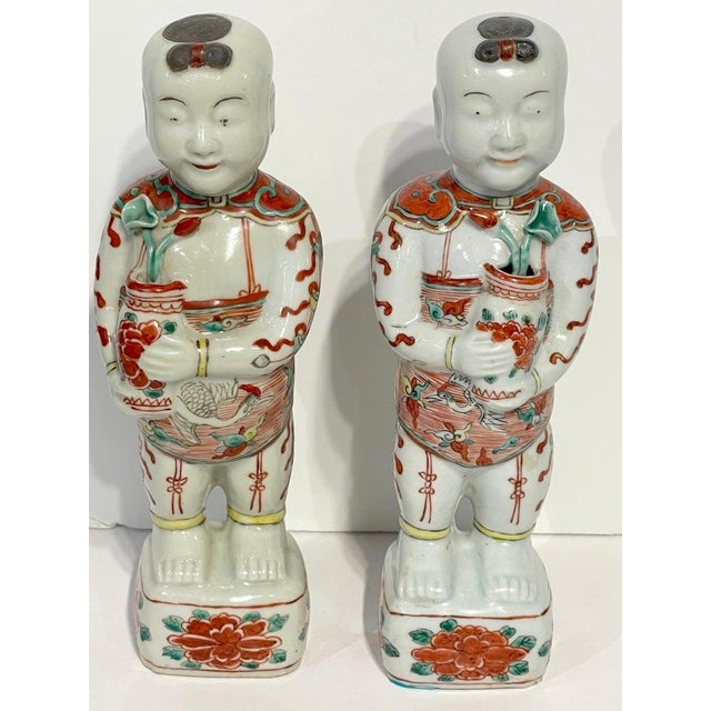 Pair of Chinese Export Famille Verte Figures of the Hehe Erxian Twins 19th Century or Older Embrace the allure of Chinese...