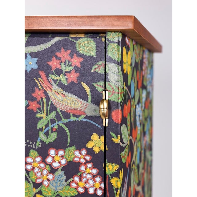 IVY Cabinet by Dosbananos. Two-door cabinet covered in original Josef Frank 'Paradiset' wallpaper. Cherry wood with brass...