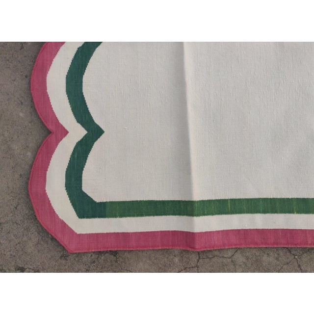Cream Handmade Cotton Vegetable Dyed Scalloped Edge Rug Cream With Green and Raspberry Pink Border - 8x10 For Sale - Image 8 of 11
