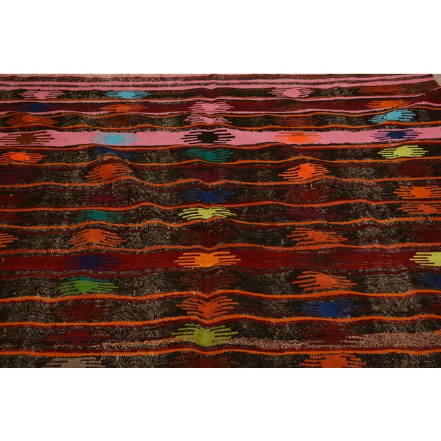 Vintage Turkish Anatolian hand woven kilim with natural colors and fine weave.