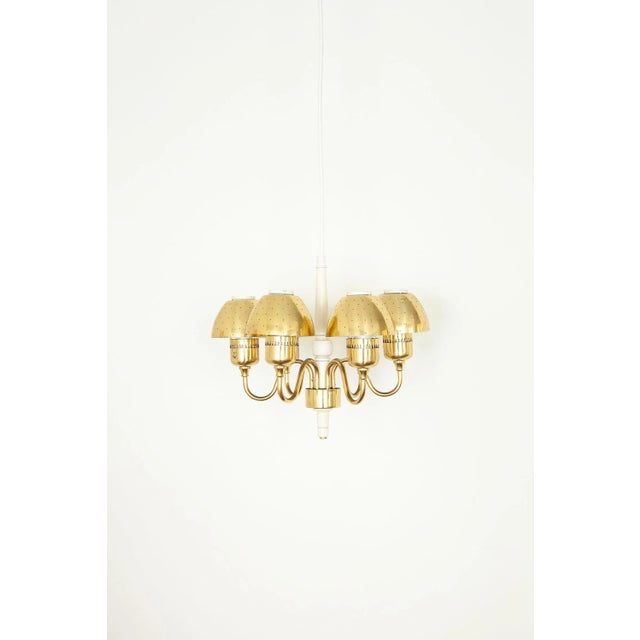 The chandelier model T 526 / M was designed by Swedish designer Hans Agne Jakobsson for Markaryd in the 1960s. Through the...