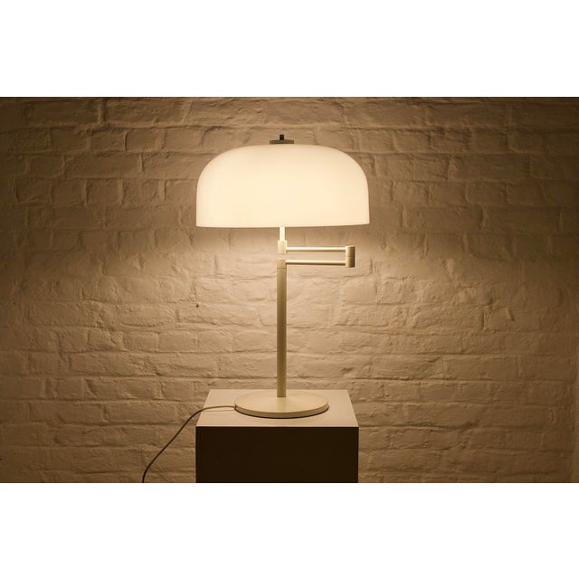 Articulated and swiveling table lamp by cosack, model 7614, original edition from the 1970s. it is equipped with three e27...