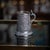 Antique 19th century indian kutch (cutch) solid silver mug. Of tapering cylindrical form, finely worked in repoussé and...
