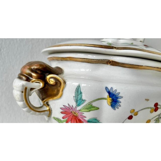 A spectacular and highly decorative Victorian Royal Worcester covered tureen, dating to approximately 1875–1876,...