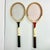 This is a set of Vintage Wood Tennis Rackets are from the 1960s. They are a set of two matching rackets under the Super...