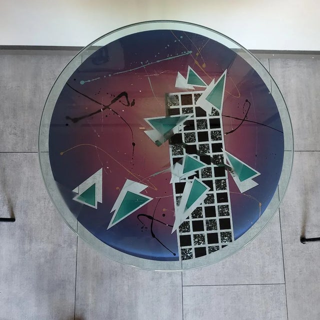 This beautiful acid etched and cut art glass table by Joan Irving is a stunning piece of functional art that will add...