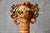 Let yourself be captivated by the magnetic presence of this anthropomorphic sculpture in glazed terracotta, a true...