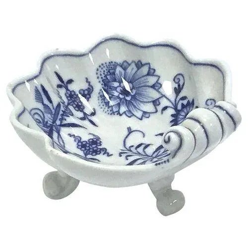Vintage porcelain Meissen dish in the blue onion pattern with scalloped edges and scrolled handle and feet. Marked "100"...