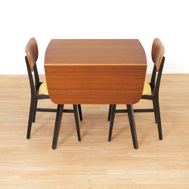 This vintage mid-century dining set is a beautiful example of the 'Librenza' range by E Gomme (G Plan) produced in the...