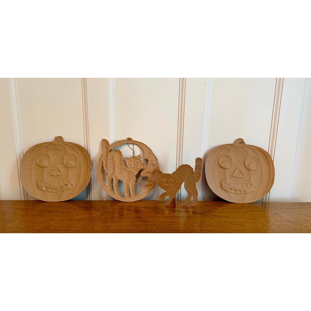 Rare original vintage die cut pressed cardboard Halloween decorations made in Germany, including two pumpkins, a crescent...