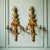 Bring timeless European elegance to your interior with this impressive pair of vintage Louis XVI-style gilt wall candle...
