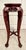 This vintage Chinese pedestal stand features a rich rosewood finish, intricate mother-of-pearl floral inlay, and elegant...