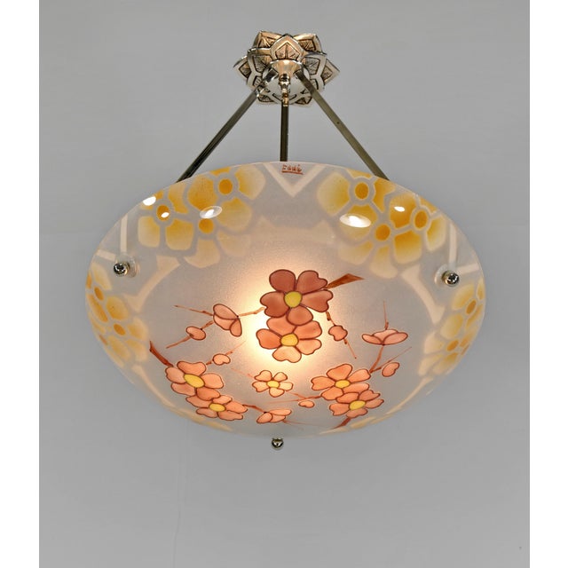 Edmond Dannhauser A nice French 1925 - 1935 art deco chandelier in nickel plated solid brass holding a bowl in enameled...