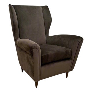 Single Italian Modernist wing chair in the style of Gio Ponti. For Sale