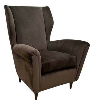 Single Italian Modernist wing chair in the style of Gio Ponti.
