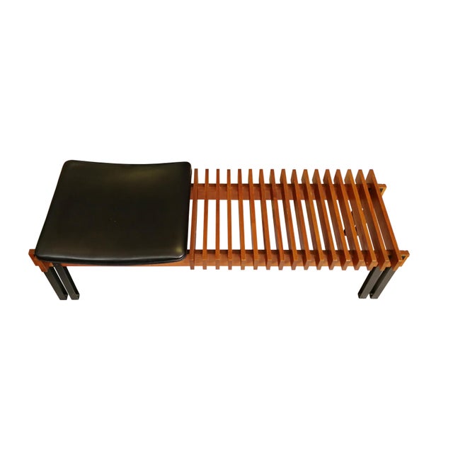 Vintage wood teak bench in lacquered metal, with pillow dressed in tiny imitation leather. Good conditions.