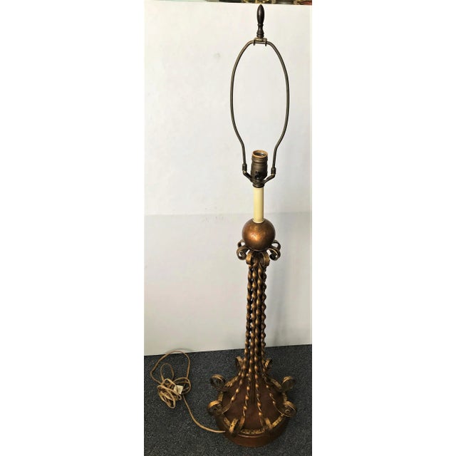 Very cool Mid-Century Modern "Hipster" table lamp circa 1950's. The original lampshade has black and gold trim details....