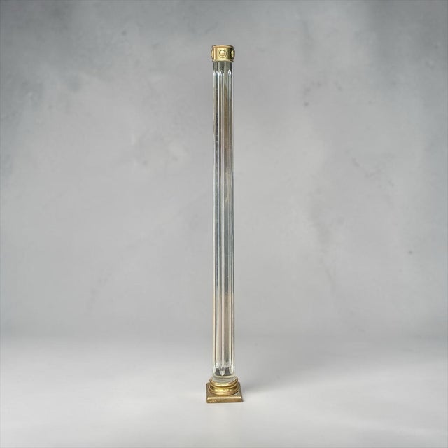 This is a pair of mid-century modern Italian neoclassical style lucite and solid brass columns or pedestals. They would...