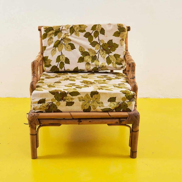 This delightful rattan armchair is an excellent example of vintage design with a natural touch. The geometric lines of the...