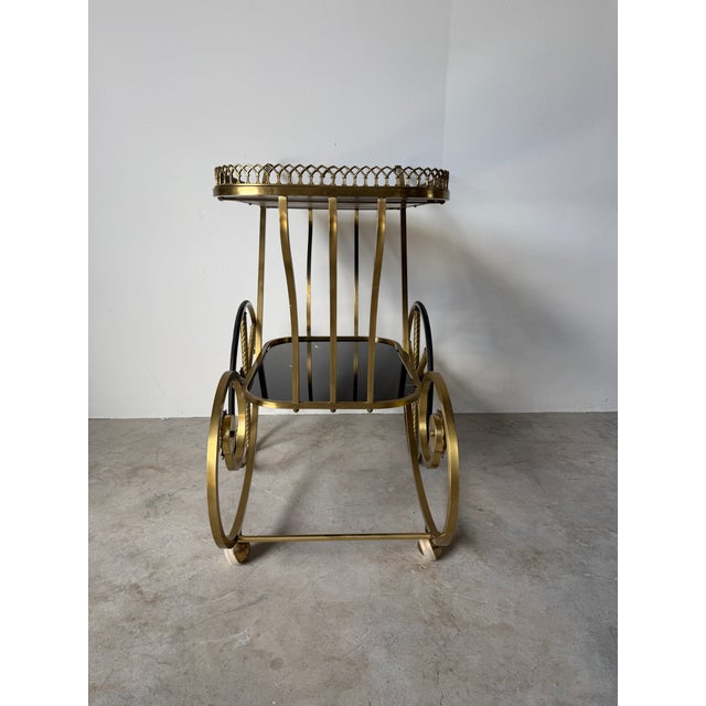 Gold 1960s Italian Hollywood Regency Scrolled Brass & Black Glass Two-Tier Bar Cart For Sale - Image 8 of 14