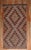 Mid-20th Century Tribal Turkish Jajim kilim in dark colors Measures: 5'4” x 10'2” With the Jijim weaving technique,...