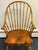 Classic 18th century inspired Windsor armchair by Ethan Allen from their country craftsman collection. Continuous arm...