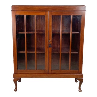 Antique Glazed Bookcase With Paneled Glass Doors and Queen Anne Legs For Sale