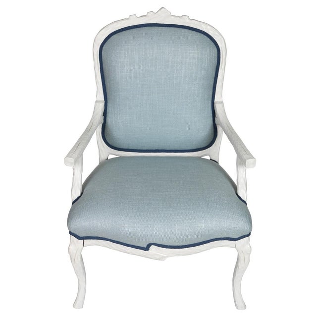 This pair of white faux bois armchairs evokes the timeless charm of classic French design. With frames carved to mimic the...