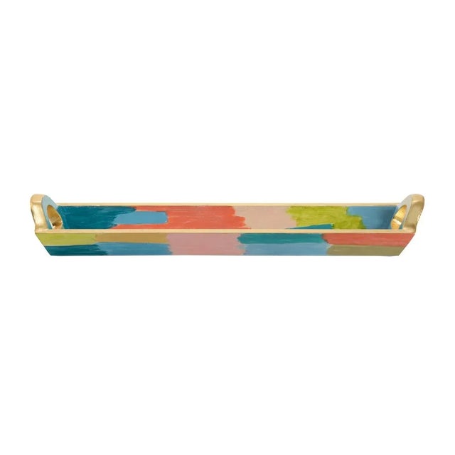 Hand painted wood tray in vibrant colors with antique gold leaf exterior and cut out handles. Beautiful as a decorative...