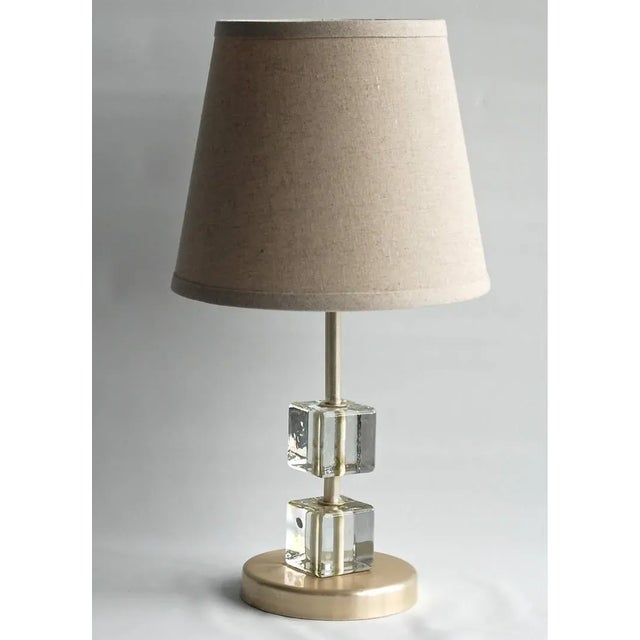 A table lamp, probably, Sweden, circa 1960s. Clear glass cubes and brass. Existing European wiring, rewiring available.