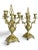 Pair of five-branched candelabras in chased and gilded bronze. Shafts and arms decorated with openwork scrolls and...
