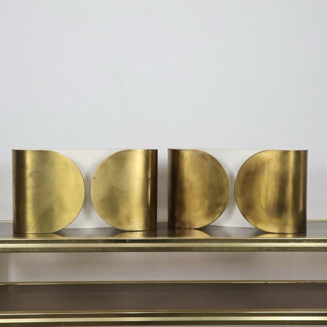 Iconic pair of Foglio wall sconces, designed in 1967 by Afra & Tobia Scarpa for Flos, one of the most representative...