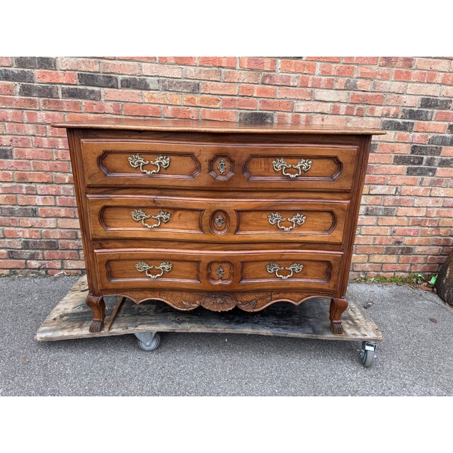 Crafted in Lyon, France circa 1760, this elegant commode exemplifies the refined craftsmanship of the Louis XV period....