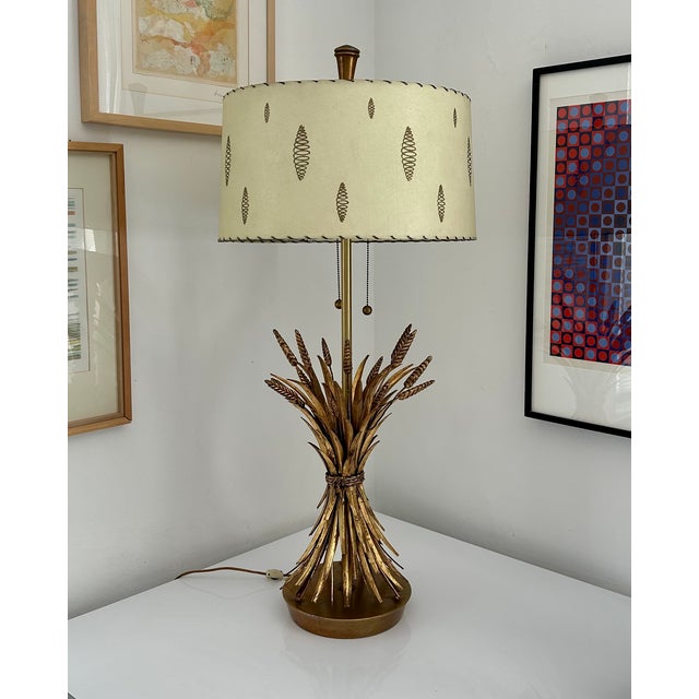Stunning Sheaf of Wheat lamp by the Marbro Lamp Company of Los Angeles circa 1960. Includes the original double sockets,...