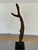 Stylish Arteriors Organic Modern Natural Teak Kazu Sculpture, black metal stand. Showroom floor sample.