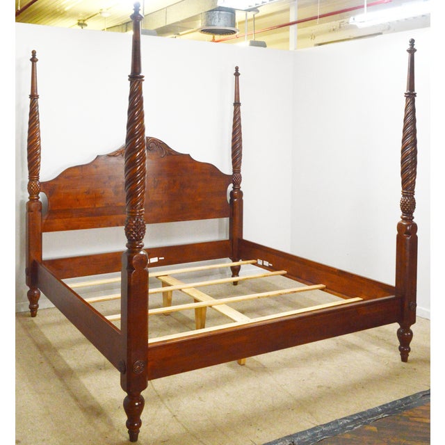 King Bed by Ethan Allen. Store item #576. It features carved details and solid wood construction.
