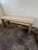 Modernist Rectangular Cream Faux Stone and Metal Leg Coffee Table A handsome architectural coffee table featuring a...