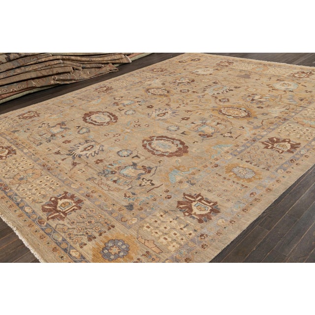 Beautiful modern Sultanabad Hand-knotted Wool rug with a light brown field, and multi-color accents in all-over geometric...