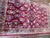 This elegant antique Persian Sarouk rug, measuring approximately 3'3" x 5'3" and dating to around 1930, is a beautiful...