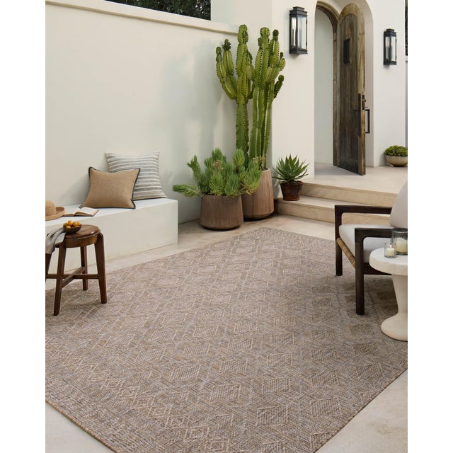 Inspired by the scenic mountain town in California, the Topanga Collection is an indoor/outdoor rug made of durable...