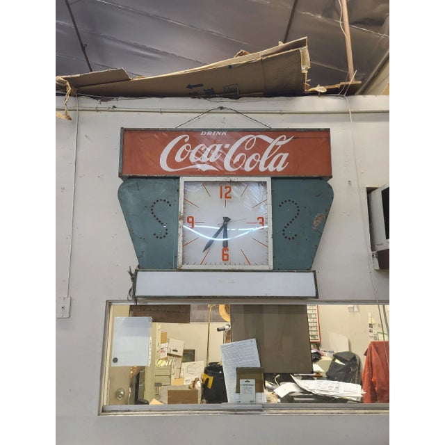 Transport yourself to the 1950s with this iconic 4' tall Coca-Cola Collectible Wall Clock. Crafted to perfection, it's a...