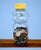 Half Spent by Josh Talbott | Acrylic on Canvas Bear-shaped jar filled with coins For Sale